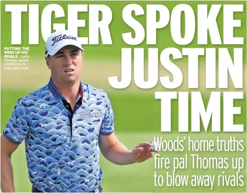  ?? ?? PUTTING THE WIND UP HIS RIVALS Justin Thomas tamed conditions to grab early lead