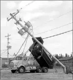  ?? — Photo submitted by Newfoundla­nd and Labrador Hydro and Newfoundla­nd Power. ?? An example of an incident where a dump truck hooked an electrical line.