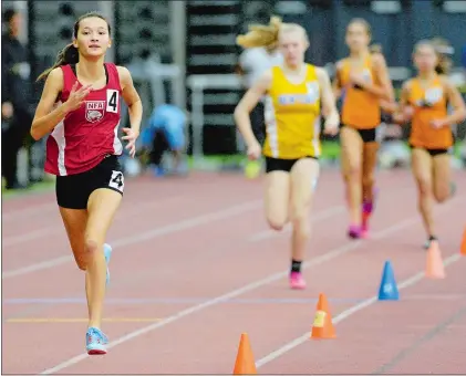  ?? DANA JENSEN/THE DAY ?? Kayla Park of NFA runs away from the field to win the 1,000 meters on Thursday at the CIAC Class LL indoor track championsh­ips at the Floyd Little Athletic Center in New Haven. Park won the event in a time of 3:02.48.