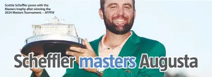  ?? – AFPPIX ?? Scottie Scheffler poses with the Masters trophy after winning the 2024 Masters Tournament.