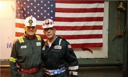  ?? Photograph: AP ?? Joe Manchin (left) poses with Labor Secretary Marty Walsh in August, during a tour of a coal mine in Dallas, West Virginia.