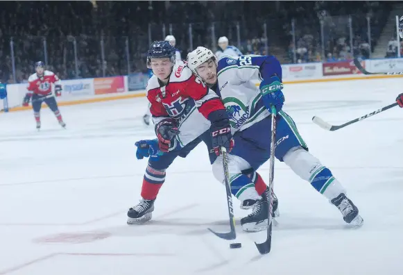  ?? STEVEN MAH ?? Tanner Nagel, right, and the Swift Current Broncos have had their work cut out for them in taking a 2-0 series lead over Calen Addison and the Lethbridge Hurricanes.