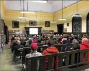  ?? DANIELLE EPTING — FOR THE RECORD ?? A large crowd at the Troy Public Library on Monday night learn more about Troy’s — and the Capital Region’s — connection to the Undergroun­d Railroad.