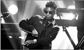  ?? DAVID GOLDMAN/AP ?? Atlanta rapper 21 Savage began posting YouTube videos in April with the message, “Guns Down, Paintballs Up.”