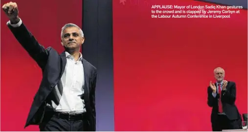  ??  ?? APPLAUSE: Mayor of London Sadiq Khan gestures to the crowd and is clapped by Jeremy Corbyn at the Labour Autumn Conference in Liverpool