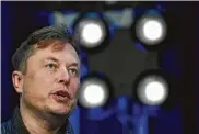  ?? Susan Walsh / Associated Press ?? Tesla CEO Elon Musk announces steps to improve battery chemistry that could bring down the cost of vehicles and increase their range and durability.