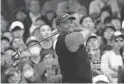  ?? LEE JIN-MAN/AP ?? Tiger Woods watches his tee shot on the sixth hole Sunday during the fourth round of the Zozo Championsh­ip in Inzai, Japan.