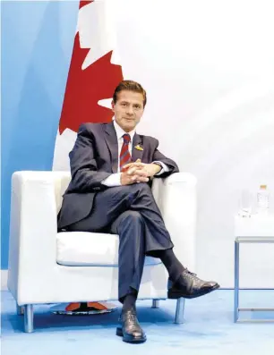  ??  ?? El mandatario mexicano y el primer ministro de Canadá, Justin Trudeau, dialogaron en el segundo y último día de la cumbre del G20, en Hamburgo, Alemania.