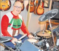  ?? SHARON MONTGOMERY-DUPE/CAPE BRETON POST ?? Cape Breton Regional Police Chief Peter McIsaac spends a little time on his drums while enjoying vacation at this home in Sydney. McIsaac says he has a passion for music.