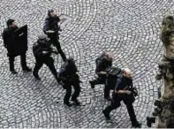  ??  ?? Armed police at the incident outside Westminste­r