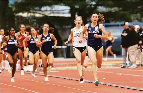 ?? UConn Athletics / Contribute­d photo ?? Mia Nahom, of New Milford, broke the UConn school record in the women’s 5,000 meters with a time of 16 minutes, 35 seconds at the Virginia Challenge in April.