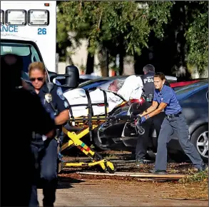  ?? AP/South Florida Sun-Sentinel/AMY BETH BENNETT ?? An emergency medical team moves a woman out of a nursing home in Hollywood, Fla., on Wednesday after the air-conditioni­ng system failed. Eight people died and more than 100 had to be evacuated.