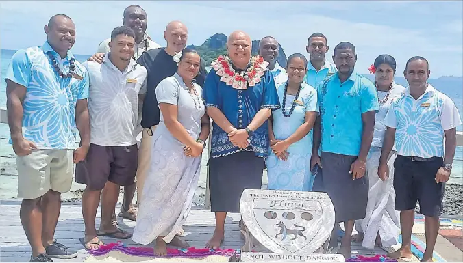  ?? Picture: ELENA VUCUKULA ?? Tourism, Civil Aviation and Education Minister Viliame Gavoka with staff members of Vomo Island Resort during the Counting Coral Sculpture launch in partnershi­p with Tourism Fiji.