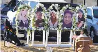  ?? DAVID ZALUBOWSKI AP ?? Portraits of those killed in the mass shooting at Club Q — (from left) Kelly Loving, Derrick Rump, Ashley Paugh, Raymond Green Vance and Daniel Aston — are displayed at a memorial outside the nightclub.