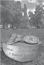  ?? AKRON BEACON JOURNAL FILE PHOTO ?? Someone has taken the bronze ornament from the Glendale Cemetery grave of Spanish-american War soldier Theodore Westwood Miller.