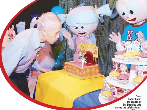  ??  ?? Oscar Lopez blows the candle on his birthday cake during the celebratio­n at Kidzania.