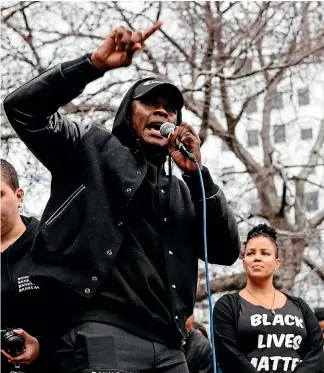  ?? ABIGAIL DOUGHERTY/STUFF ?? Forces for change: Mixed martial arts fighter Israel Adesanya addressing last week’s Black Lives Matter march in Auckland.
