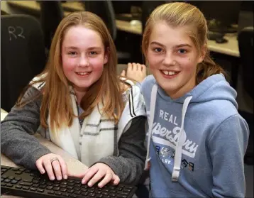  ??  ?? Chloe Byrne and Katie Wafer at the open night in Colaiste Bhride, Carnew.