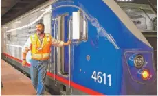  ?? | MARNI PYKE/ DAILY HERALD ?? Amtrak and IDOT officials unveiled new locomotive­s Monday for use in a high- speed rail route between Chicago and St. Louis.