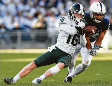  ?? Icon Sportswire via Getty Images ?? John Reid (29) brings a studious approach to football and interned for Blizzard Entertainm­ent and Intel.