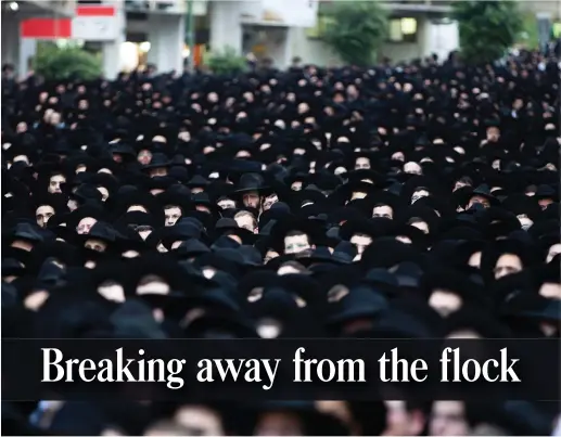  ?? (Ronen Zvulun/Reuters) ?? HAREDIM GATHER en masse in Bnei Brak. Is their leadership’s political model sustainabl­e?