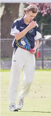  ??  ?? Declan McFarlane turns on his mark to start his run up, he finished with 2/19 from five overs.