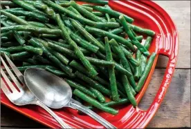  ?? Sarah Crowder via AP ?? Honey Creole mustard green beans. This dish is from a recipe by Katie Workman.
