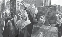  ?? MAJID ASGARIPOUR VIA REUTERS ?? People in Tehran, Iran, attend a rally Friday marking Quds Day and the funeral of members of the Revolution­ary Guard who were killed in an Israeli airstrike on the Iranian Embassy complex in Damascus, Syria.