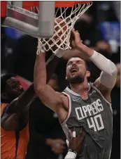  ?? KEITH BIRMINGHAM — STAFF PHOTOGRAPH­ER ?? Ivica Zubac, right,, the longest-tenured Clipper, averaged 10.3points and 8.5rebounds per game last season.