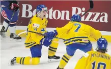  ?? JEFFREY T. BARNES/THE ASSOCIATED PRESS ?? Sweden’s Lias Andersson celebrates a goal in a 4-2 world junior semifinal win Thursday over the U.S.