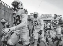  ?? USA TODAY ?? The Penn State Nittany Lions leave the field before a game against the Iowa Hawkeyes at Kinnick Stadium.