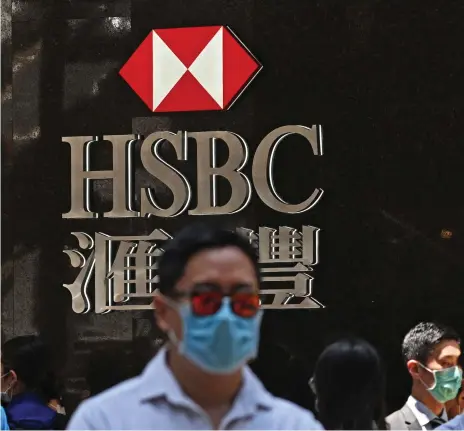  ??  ?? An HSBC branch in Hong Kong. The bank’s retail transactio­ns conducted digitally in the city hit 94 per cent in March AFP