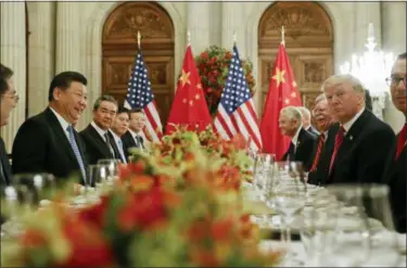  ?? PABLO MARTINEZ MONSIVAIS - THE ASSOCIATED PRESS ?? On Dec. 1, President Donald Trump, second from right, meets with China’s President Xi Jinping, second from left, during their bilateral meeting at the G20 Summit, in Buenos Aires, Argentina. China promised Wednesday, Dec. 5, to carry out a tariff cease-fire with Washington but gave no details that might help dispel confusion about what Presidents Xi and Trump agreed to in Argentina.