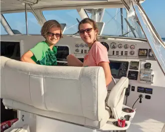  ??  ?? Boat-schooling has taken many forms for Michael and Elizabeth during their years afloat, but overall, the family has embraced that education is everywhere.