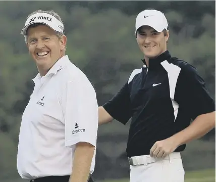  ??  ?? 0 Colin Montgomeri­e, left, and Marc Warren celebrate after landing Scotland’s first success in the World Cup