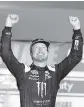  ?? ISAAC BREKKEN AP ?? Kurt Busch celebrates after winning at Las Vegas on his 22nd attempt.