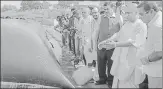  ?? PTI ?? ▪ Union minister Nitin Gadkari and chief minister Yogi Adityanath inspect a sewage treatment plant at Kukurail on Tuesday.