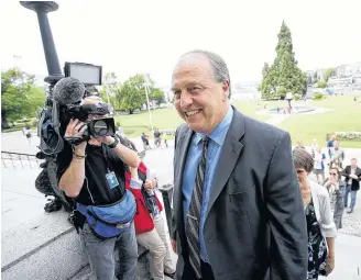  ?? REUTERS/KEVIN LIGHT/FILE PHOTO ?? Andrew Weaver arrives at the Legislativ­e Buildings with Adam Olsen and Sonia Furstenau prior to being sworn in as Members of the Legislativ­e Assembly in Victoria, B.C., June 7, 2017.