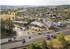  ??  ?? FOR SALE: The Harlaxton shopping centre, featuring Red Rooster and Foodworks, will go under the hammer at the end of October. PHOTO: CONTRIBUTE­D