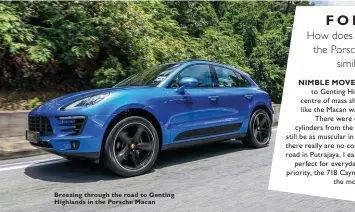  ??  ?? Breezing through the road to Genting Highlands in the Porsche Macan