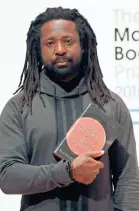  ??  ?? Author of four novels, the 48-year-old Marlon James has made an art of “finding what would rather stay lost,” as he writes in his new work, “Black Leopard, Red Wolf.” FRANK AUGSTEIN/AP