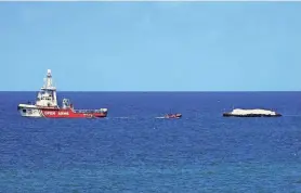  ?? AFP VIA GETTY IMAGES ?? The Open Arms vessel that set sail from Larnaca in Cyprus carrying humanitari­an aid approaches the coast of Gaza on Friday. The ship was visible off the war-ravaged territory on Friday.