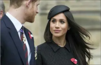  ?? EDDIE MULHOLLAND — POOL VIA AP, FILE ?? In this file photo, Britain’s Prince Harry and Meghan Markle attend a Service of Thanksgivi­ng and Commemorat­ion on ANZAC Day at Westminste­r Abbey in London.