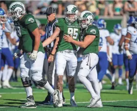  ?? JON AUSTRIA/FORT COLLINS COLORADOAN ?? Colorado State’s Cayden Camper (95) is congratula­ted by teammates after kicking a field goal against San Jose State on Saturday.