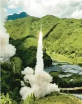  ?? CCTV ?? A projectile launches Thursday from an unspecifie­d location in China. Its “precision missile strikes” into the Taiwan Strait during military exercises have raised regional tensions.