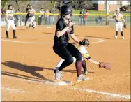  ?? MARK HUMPHREY ENTERPRISE-LEADER ?? Lincoln senior Hollie Webb was originally ruled out on this play with Prairie Grove first baseman Kylie Scott’s foot on the bag while making a catch from shortstop. Lincoln coach Beau Collins appealed and the call was reversed with Webb gaining a...