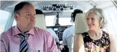  ?? ALLAN BENNER/POSTMEDIA NEWS ?? Niagara-on-the-Lake Lord Mayor Pat Darte and Niagara District Airport Commission vice-chair Robin Garrett are pictured aboard a FlyGTA plane preparing for landing at the Niagara-on-the-Lake airport on Tuesday.