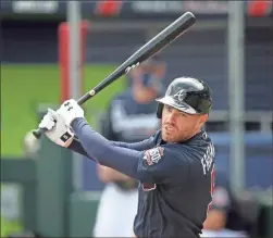  ?? AP-Curtis Compton, File ?? Atlanta Braves first baseman Freddie Freeman watches his hit during live batting practice before playing the Baltimore Orioles in a spring baseball game at CoolToday Park in North Port, Fla., on March 3.