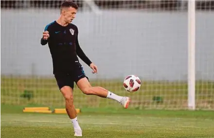  ??  ?? Ivan Perisic practises ball control during training in Sochi on Wednesday as Croatia prepare for their quarter-final match against hosts Russia at the Fisht Stadium on Sunday. AFP PIC