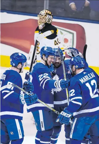  ?? PHOTOS: PETER J. THOMPSON ?? Toronto Maple Leaf Tomas Plekanec, centre, celebrates an open-net goal in a 3-1 win over the Boston Bruins as Bruins goalie Tuukka Rask skates by in the background in the third period of Game 6 of their first round series at Toronto’s Air Canada Centre...